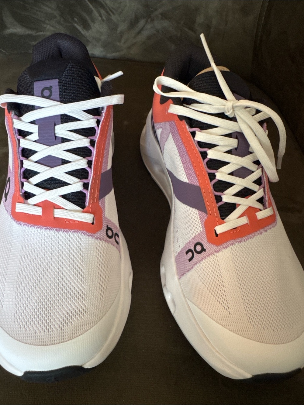 On Running Men’s Athletic Shoes in White with Purple & Coral Accents